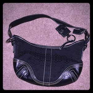 Black leather coach purse